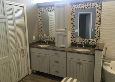 black and white bathroom cabinets and tile