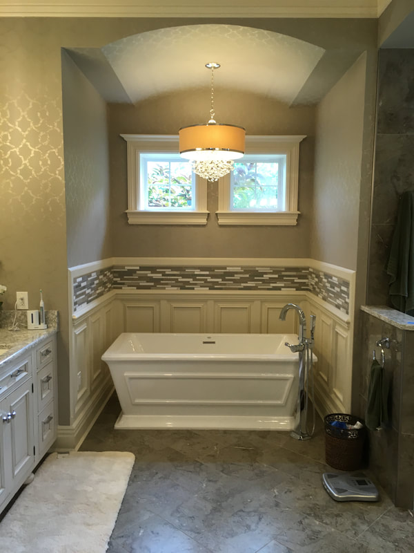 newly tiled bathroom and tub